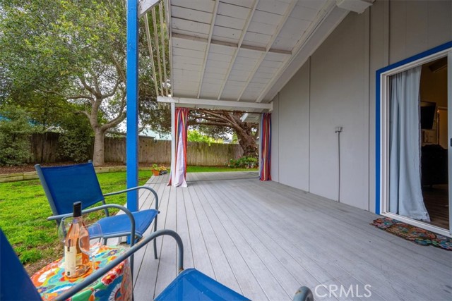 Surrounded by trees this backyard offers a private escape from the world