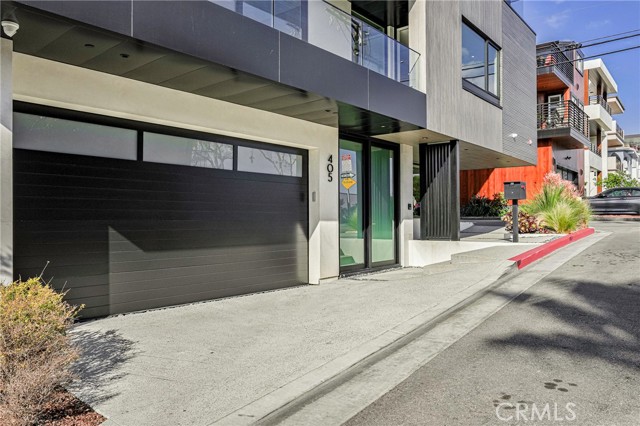 Attached 2 car garage, plus room for another car on the driveway and another car in the private guest parking spot.