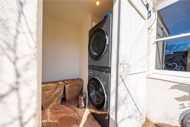 Laundry area just off the back of the home.