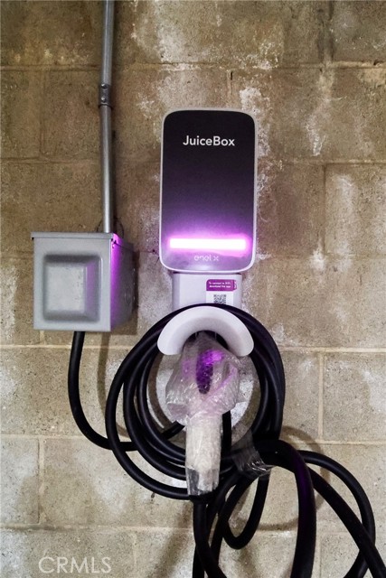 EV Charger next to 2 Parking Spots