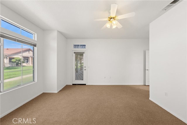 First Primary Bedroom w/ access out to patio