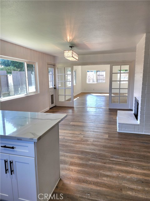 view from kitchen to dining room and family room