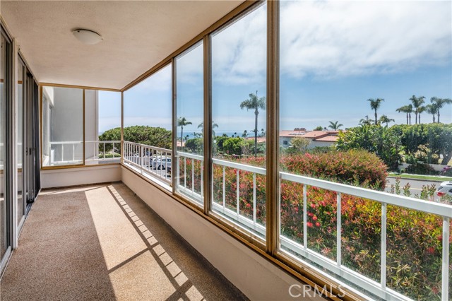 Wide porch for afternoon sun and ocean views.