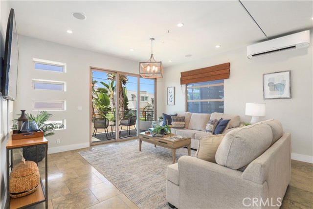 Warm and inviting formal living space with attached balcony