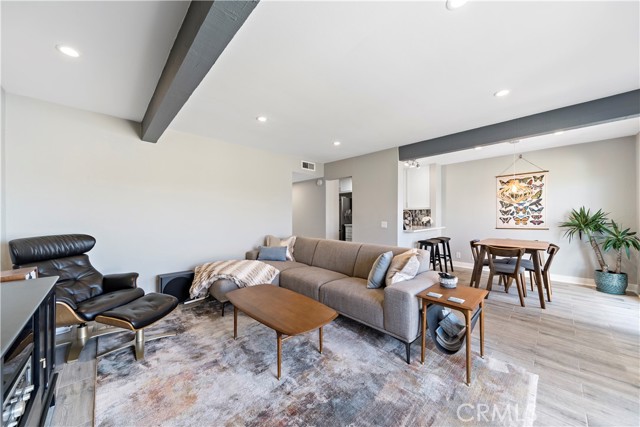 Open Living Room with wood beams.