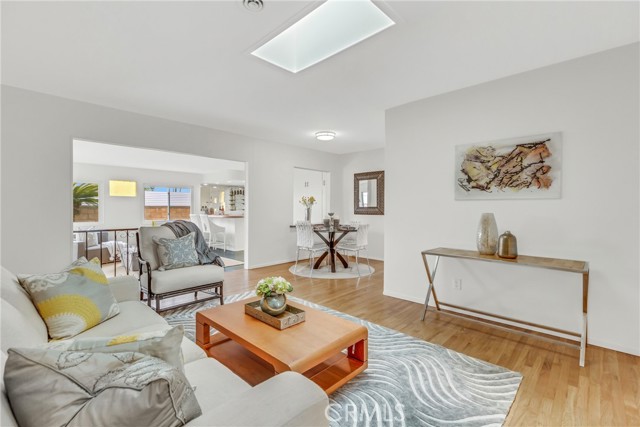 Living room with glance into dining room