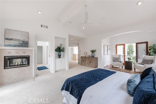 Primary Suite with sitting area/alcove and  two sided fireplace