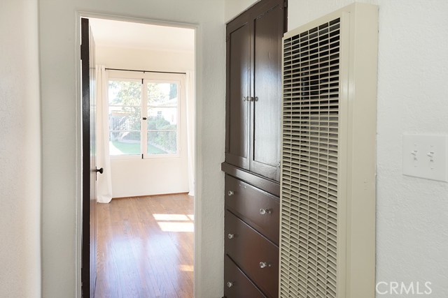 A wall heater in the hall warms those two bedrooms and a spacious built in linen closet is a necessity.