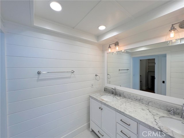 Double vanity sink in primary bathroom.