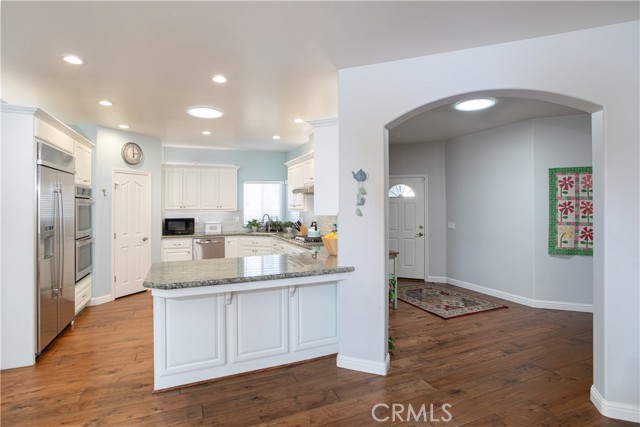 The kitchen opens up to a spacious family room ideal for entertaining