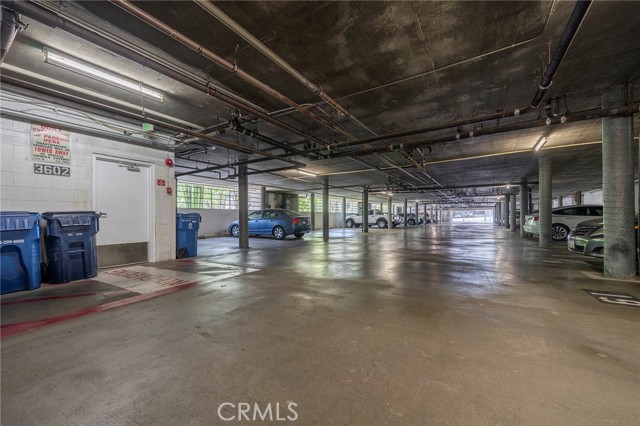 The subterranean garage is well lit and wide spaced.