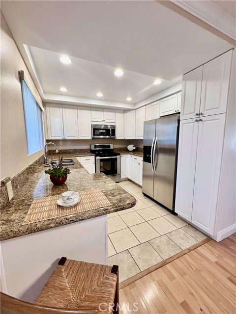 Another view of the kitchen showcasing the spacious pantry—perfect for extra storage and organization.