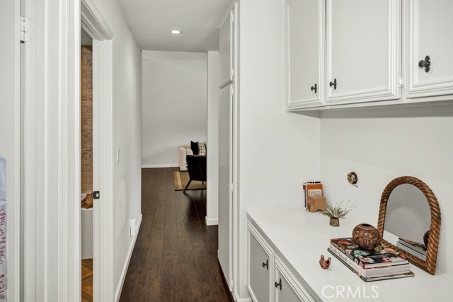 View of the hallway with the living room at the end.