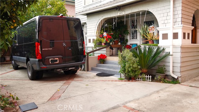 Front Entry access revealing extra parking space.