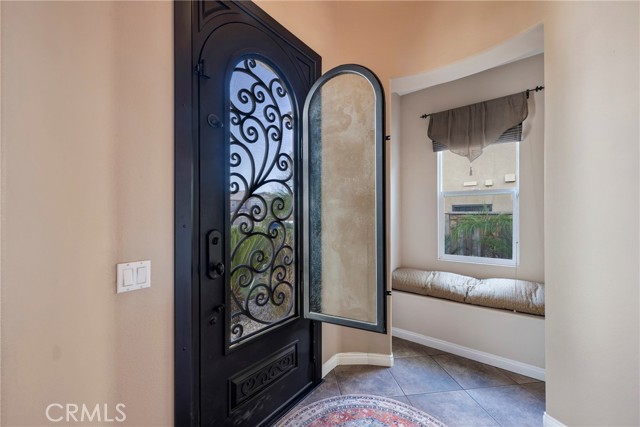 This custom front door is elegant AND secure (we will show you).  It also has the ability to let the cool evening and morning air pass through without compromising security.