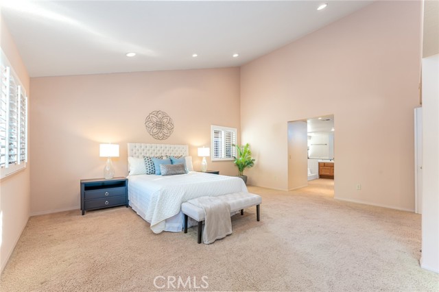 Master bedroom with vaulted ceilings