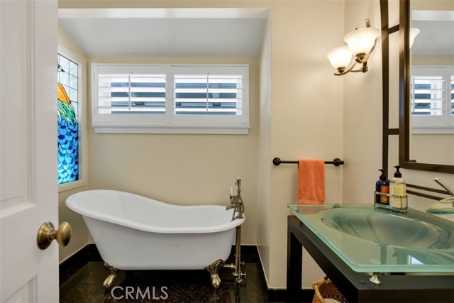 Peacock stained glass bath