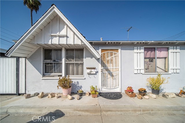 Charming architecture with the pitched roof and shutters.