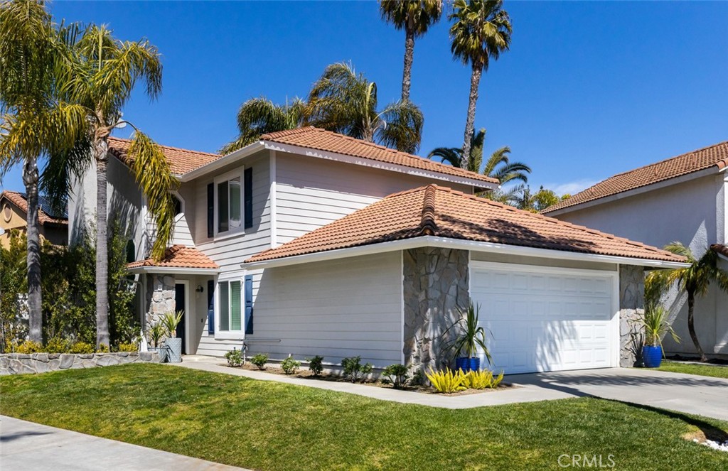 1 Firenze Street Laguna Niguel, California Welcome to the beautiful turnkey home situated at the end of 1 Firenze Street, which is arguably one of the best family neighborhoods in all of Laguna Niguel! Enjoy a private lot with neighbors only to one side of the property. Upon entering, you will notice this home boasts a ton of natural light along with new energy efficient windows, hot water heater, HVAC, and has been fully repiped with PEX piping. This upgraded home also boasts brand new laminate flooring, recessed lighting, a new contemporary banister, and upgraded Pottery Barn lightening fixtures throughout. The kitchen has been freshly updated with all new countertops, backsplash, refrigerator, sink, faucet, and hardware. Additionally, it has all new kitchen appliances, quartz countertops, soft close kitchen drawers, an adjacent pantry, and upgraded cabinet knobs, kitchen faucet and sink. Your kids will love the playroom just off the kitchen so you can watch them while you cook. The home also has an in home laundry area with tons of storage, an updated powder room with granite countertops, custom built in vanity and a capiz shell backsplash with high end rope mirror. The backyard is spacious with a large grass area that wraps around the side of the house and has a lemon, lime, orange, and avocado trees. Upstairs you will find all 3 bedrooms along with a fully remodeled guest bathroom with quartz countertops, Carrara marble tile in the bathtub with custom cut outs for you favorite bath accessories, there is a pottery barn shelf for utility and decoration along with an upgraded mirror and pottery barn scones to frame it. Walk down the hallway and you will find the master suite complete with vaulted ceilings, fireplace, and a beautiful archway that leads you to the fully remodeled master bathroom complete with custom walk in shower boasting 2 shower heads, Carrara marble tile work, and quartz bench. Across the bathroom find your dual sink vanity with quartz countertops and custom mirror and get ready below a luxurious Pottery Barn chandelier. The bathroom offers a separate water closet and leads into a walk in closet. Don’t miss this gorgeous home where no detail has been spared!