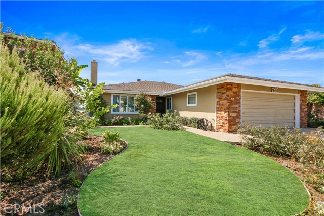4872 Dogwood Avenue Seal Beach, California 3 Bedroom, 2 bath remodeled home in College Park East of Seal Beach. This beautiful home is complete from top to bottom. The home features central ac and heat, dual pane vinyl windows, copper plumbing, tankless hot water heater, remodeled kitchen, remodeled bathrooms, smooth ceilings, wood floors, baseboards, crown molding and much more. Both the front and backyards are landscaped and complete with sprinklers. The garage has an automatic garage door opener and direct access to both the house and the side yard. The remodeled kitchen comes with Stainless Steel appliances, the microwave is built-in and includes a vent fan that is vented to the exterior of the home. The cook-top is a 5 burner electric cook-top (black) and there are double ovens (electric). The laundry room is inside and also features access to the side yard, via a private door. The home is centrally located, is close to the shops and major freeways. The home also sits within the boundaries of the Los Alamitos Unified School District.