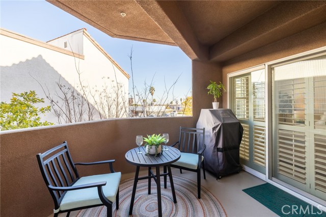 Main balcony - off living areas and shared with Bedroom 2.