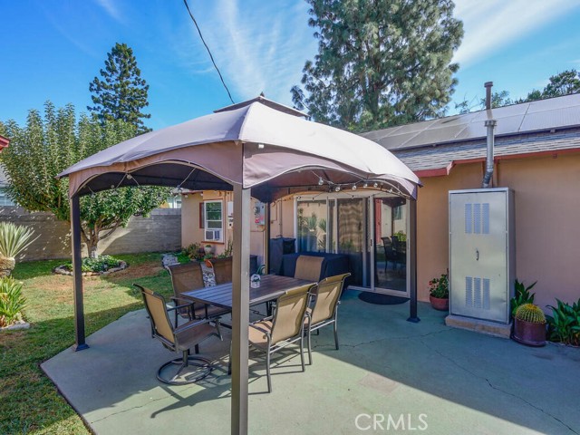 Rear patio, back of home and 