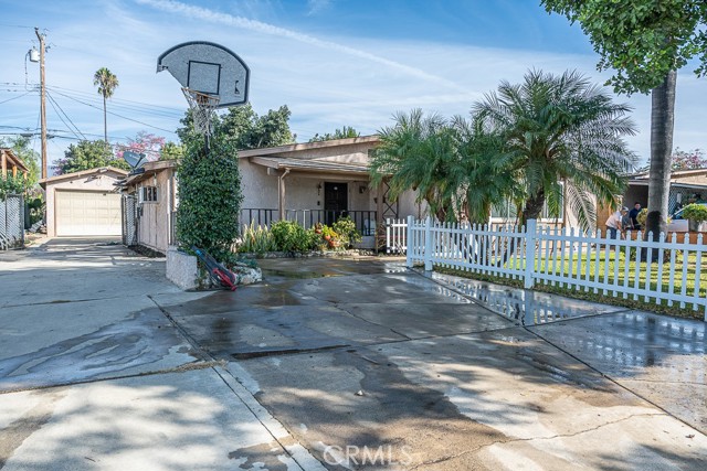 View of duel driveway & 2 car detached garage.