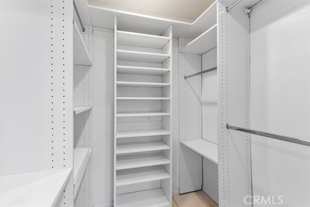 Walk-in closet with custom organizers!