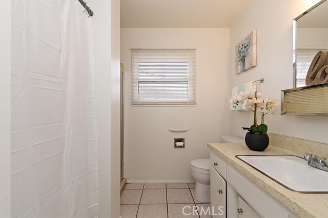 Full bathroom with separate walk in shower