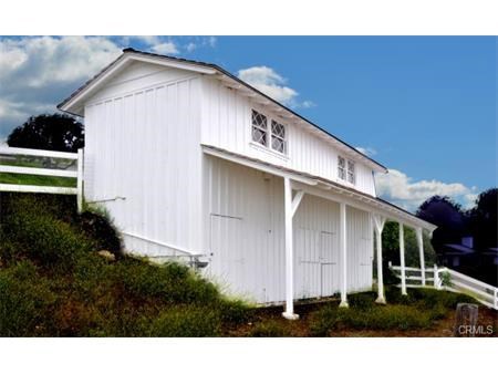 4-stall horse barn with a tack room above