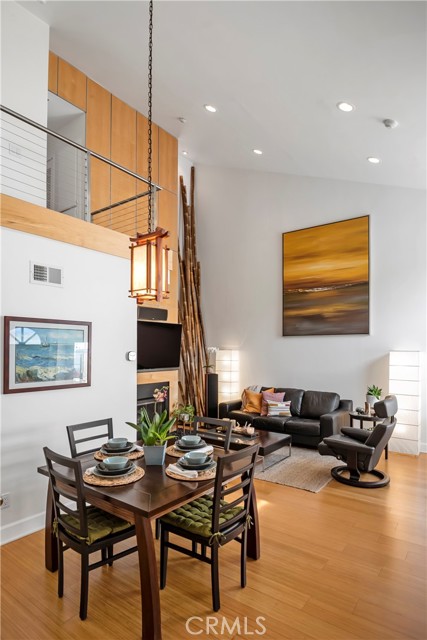 2-story volume in open-flow living & dining rooms