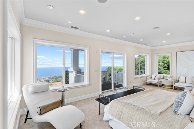 Primary bedroom with unobstructed ocean view.