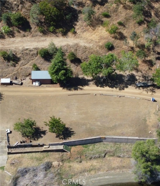 property line between the trees, steps leading to your beach