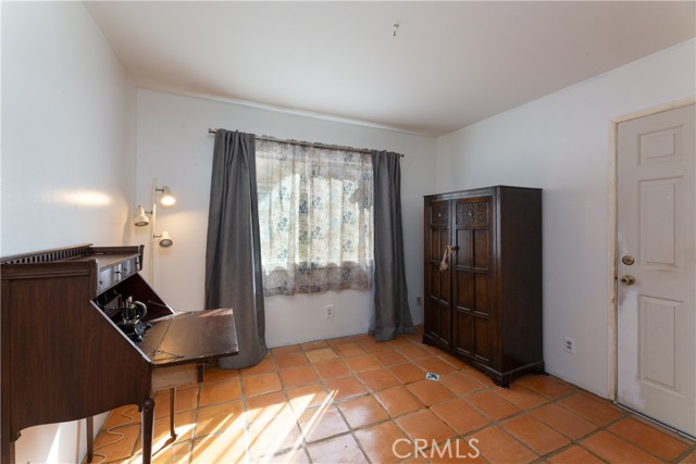 Bedroom two is being used as a craft room and has direct garage door access.