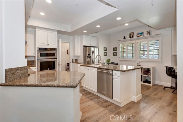 Large kitchen with granite counters