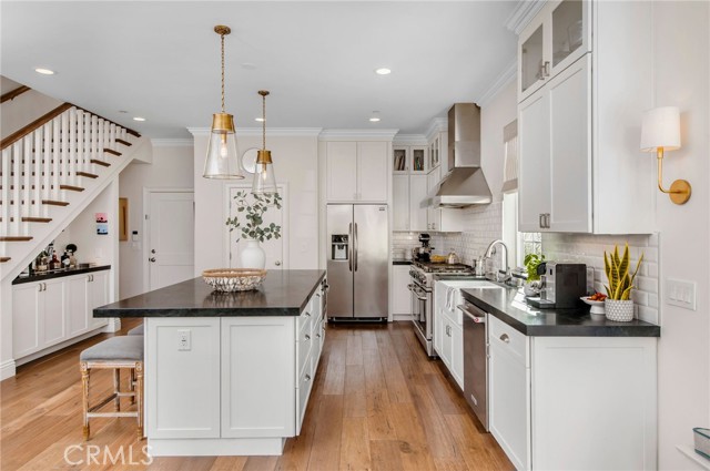 Timelessly designed kitchen, storage for days and walk-in pantry.