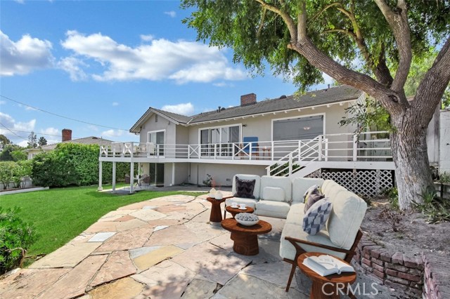 Spacious enclosed backyard great for entertaining, for kids to play or to rest in the shade.