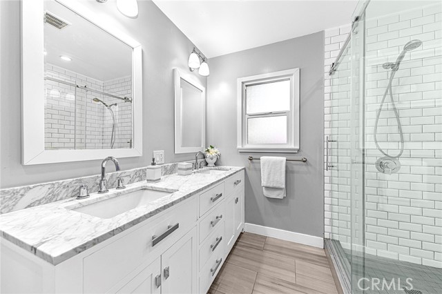 Guest bathroom, double sink vanity with window