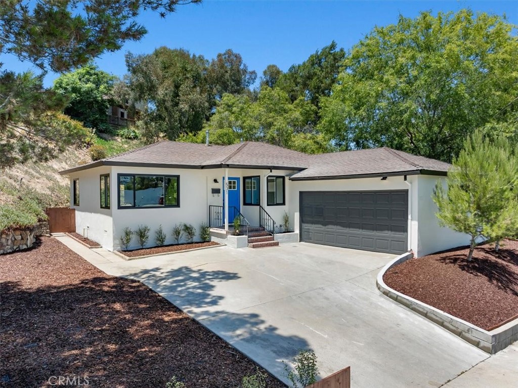 Buyer Agent Commission is 2.5%. Embrace a lifestyle of comfort, style, and modern convenience in this North Redondo Beach home perched above the street on large lot with both front and back yards perfect for outdoor living. Packed with numerous upgrades, you can simply pack your bags and move right in! The interior features stylish finishes and contemporary comforts, with open concept living and dining areas that open up to an expansive backyard for entertaining. The kitchen is a chef's dream, equipped with sleek stainless-steel appliances, new countertops, new cabinets and a kitchen island to convene around. 
There is  a primary bedroom that includes an en-suite bathroom for added privacy and convenience. Additionally, there are two sizable bedrooms, all with hardwood floors and ample closet space. The entire house has updated lighting and new windows that welcome the nearby ocean breeze but in case you are wanting there is A/C for those extra hot days. Updated homes with this price tag that feed into Jefferson Elementary and are a quick bike ride to the beach are RARE in the Southbay. Buy this now and watch your investment grow exponentially.  Do not let this opportunity pass you by.