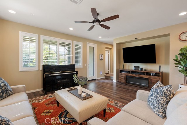 Wired for electronics, the enterainment center flows seamlessly iwth open floor plan