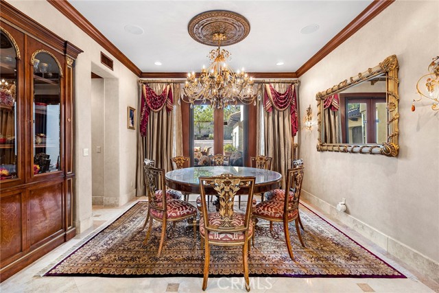 Formal dining room opens to the courtyard.