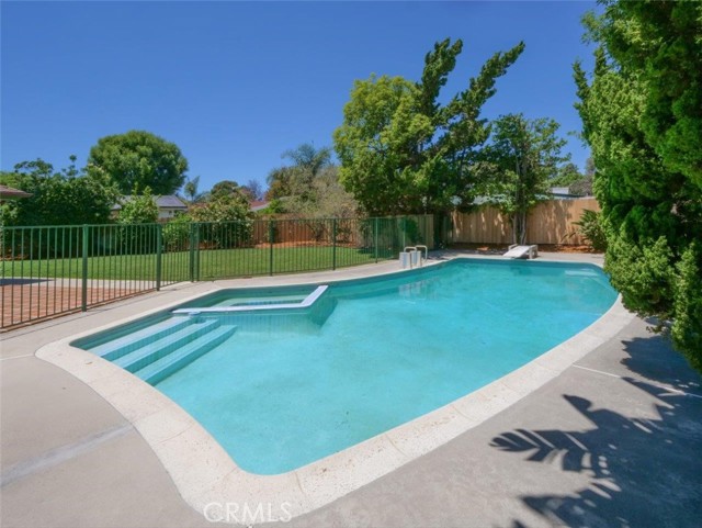 Continue the tour of the yard with the pool and note the beautiful new perimeter fencing.