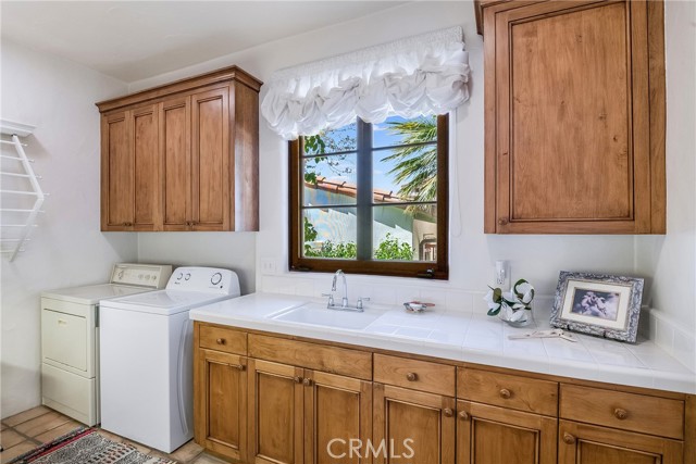 Separate laundry room just past pantry room