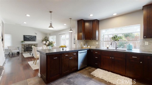 completely remodeled gourmet kitchen.  shaker style cabinets, granite countertops, fabulous breakfast bar