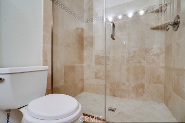 Beautifully tiled double shower.