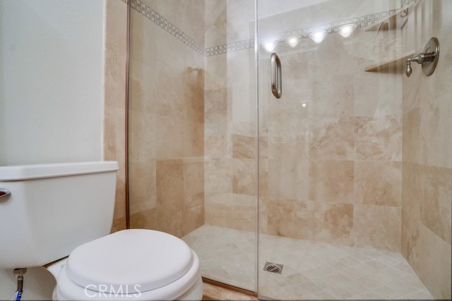 Beautifully tiled double shower.