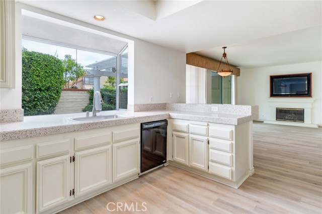 Bright Kitchen with Granite Counters, Garden Window and New Flooring