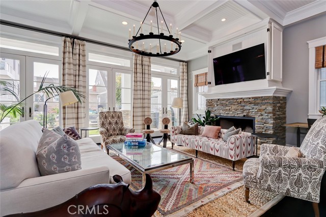 Living Room opens up to Private Walk Street Patio blending Indoor - Outdoor Living.