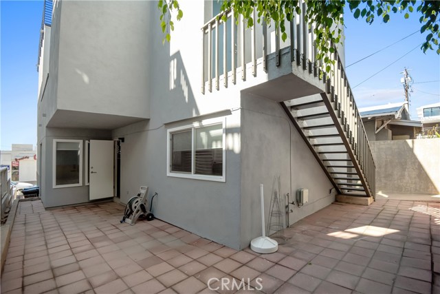 Ground floor patio
Stairs lead to 2nd patio and rooftop deck