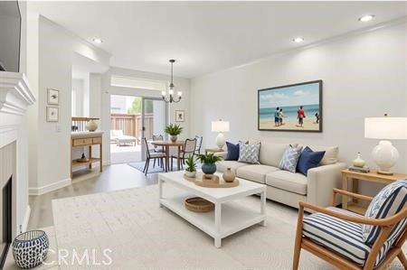 Light and airy living space that opens out to a oversized patio.  Virtual staging.